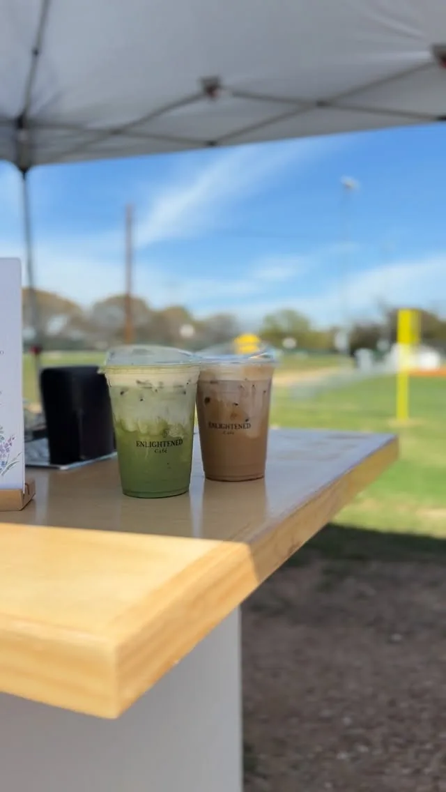 Iced matcha latte and iced coffee served from the Enlightened Café cart at an outdoor DFW event