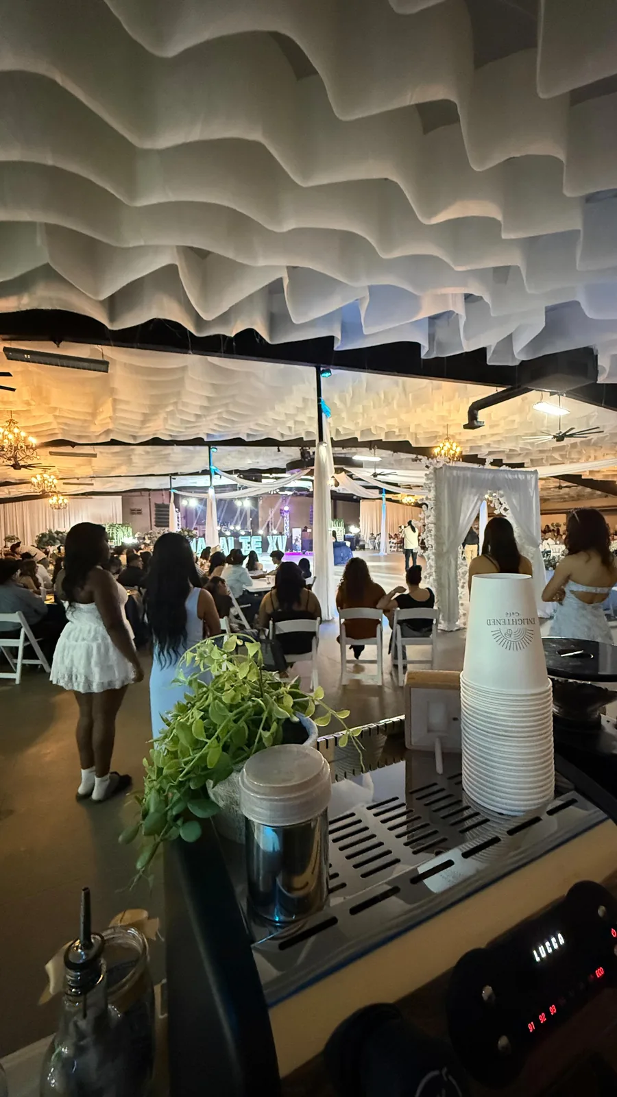 Enlightened Café coffee catering serving guests at a quinceañera in a Dallas event hall